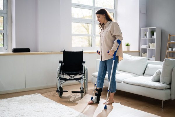 woman on crutches depicts the cost of injury